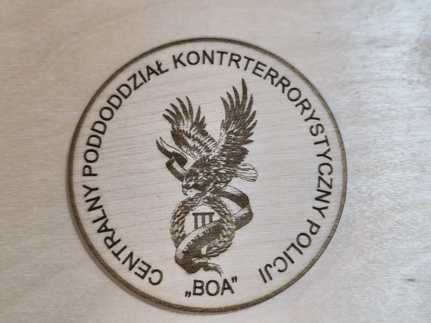 podkładka pod kubek z odznaką "BOA"